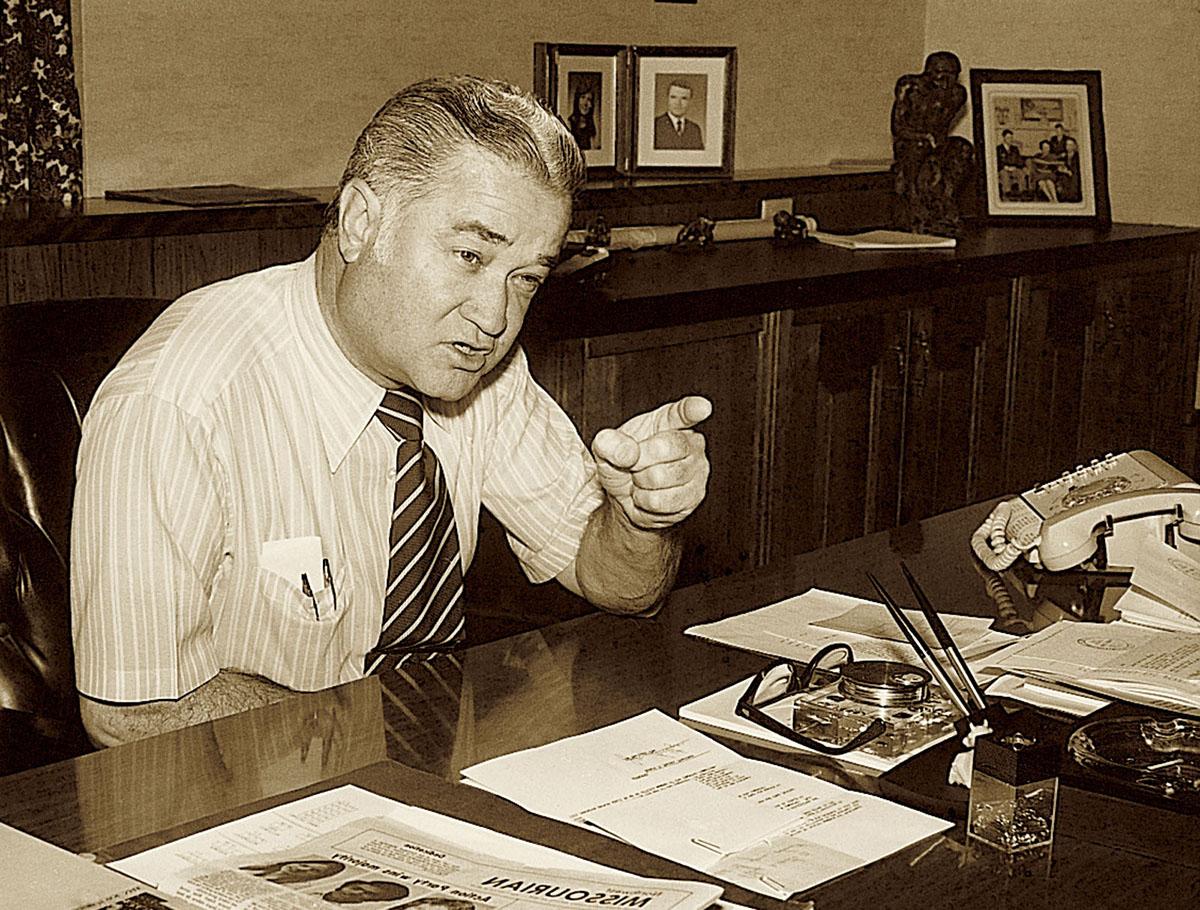 Foster in his office in the Administration Building.