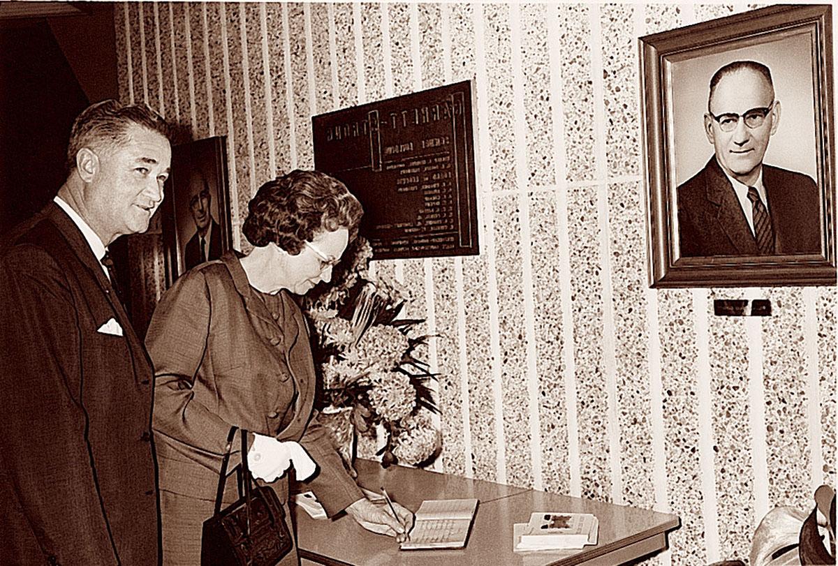 President Foster and his wife, Virginia, sign the guest book at the dedication of the Garrett-Strong Science Building in 1968,