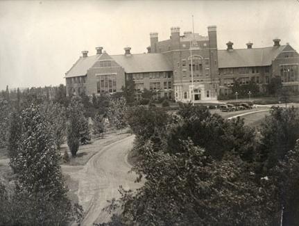 Over the main entrance to the Administration Building, which was called Academic Hall, there is a carving that reads "And The Truth Shall Make You Free."  The saying was chosen by the first president of the Board of Regents, Charles Colden.